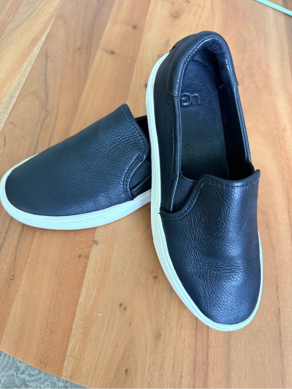 UGG Women's Black Slip-On Leather Platform Slip On Shoes